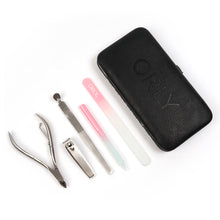 Charger l&#39;image dans la galerie, Kit manucure magnétique ORLY pour manucures et pédicures | Kit de voyage pour les ongles avec deux limes à ongles en verre, un repousse-cuticules, une pince et un coupe-ongles pour un soin des ongles en déplacement
